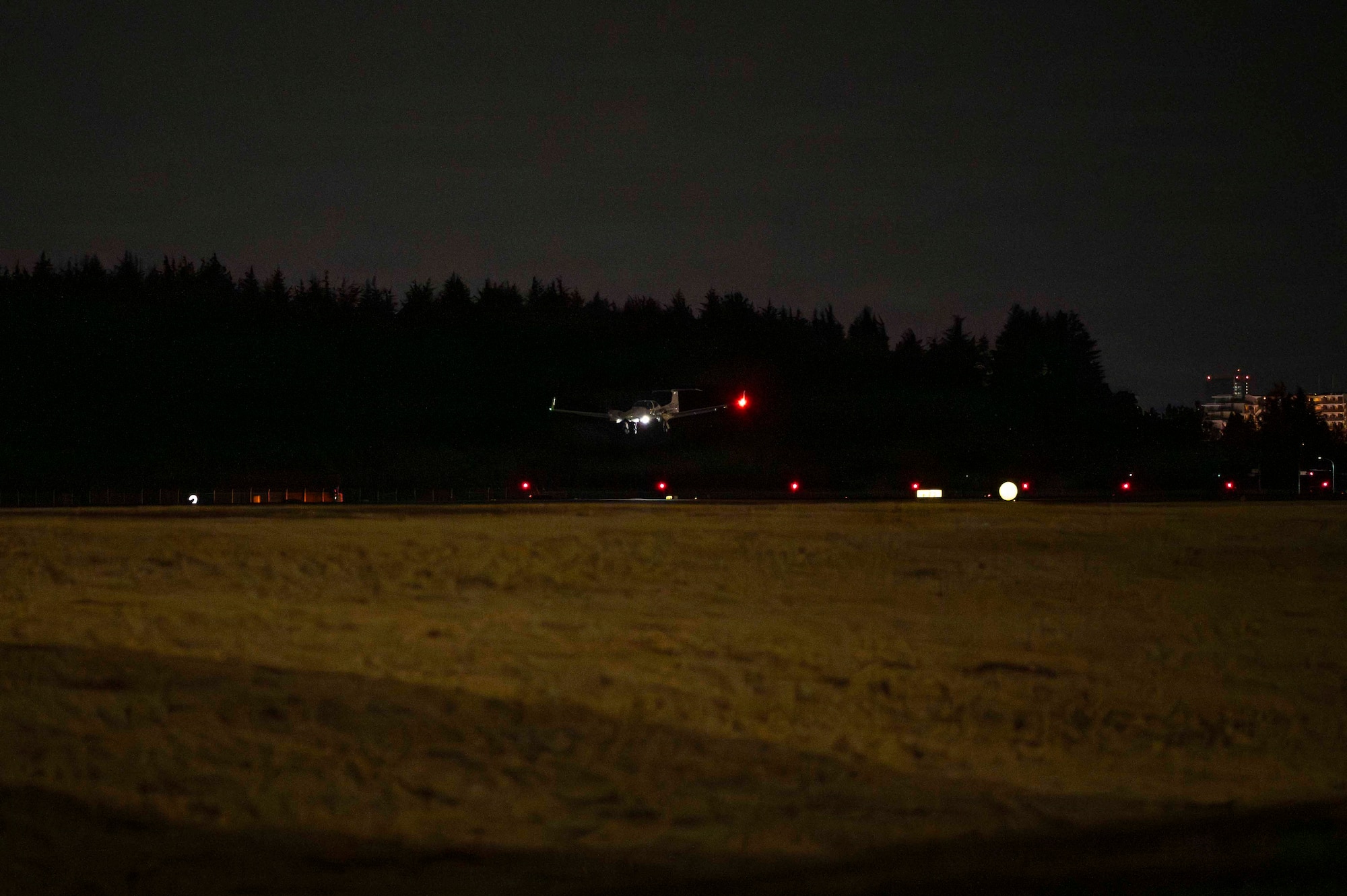 A Diamond DA42 NG Twin Star assigned to the Yokota Flight Center lands during a small parts delivery mission as part of exercise Beverly Midnight 2026 at Yokota Air Base, Japan, March 13, 2026. BM26 provides an optimal environment to enhance and understand possible opportunities to continue the advancement of shared interests