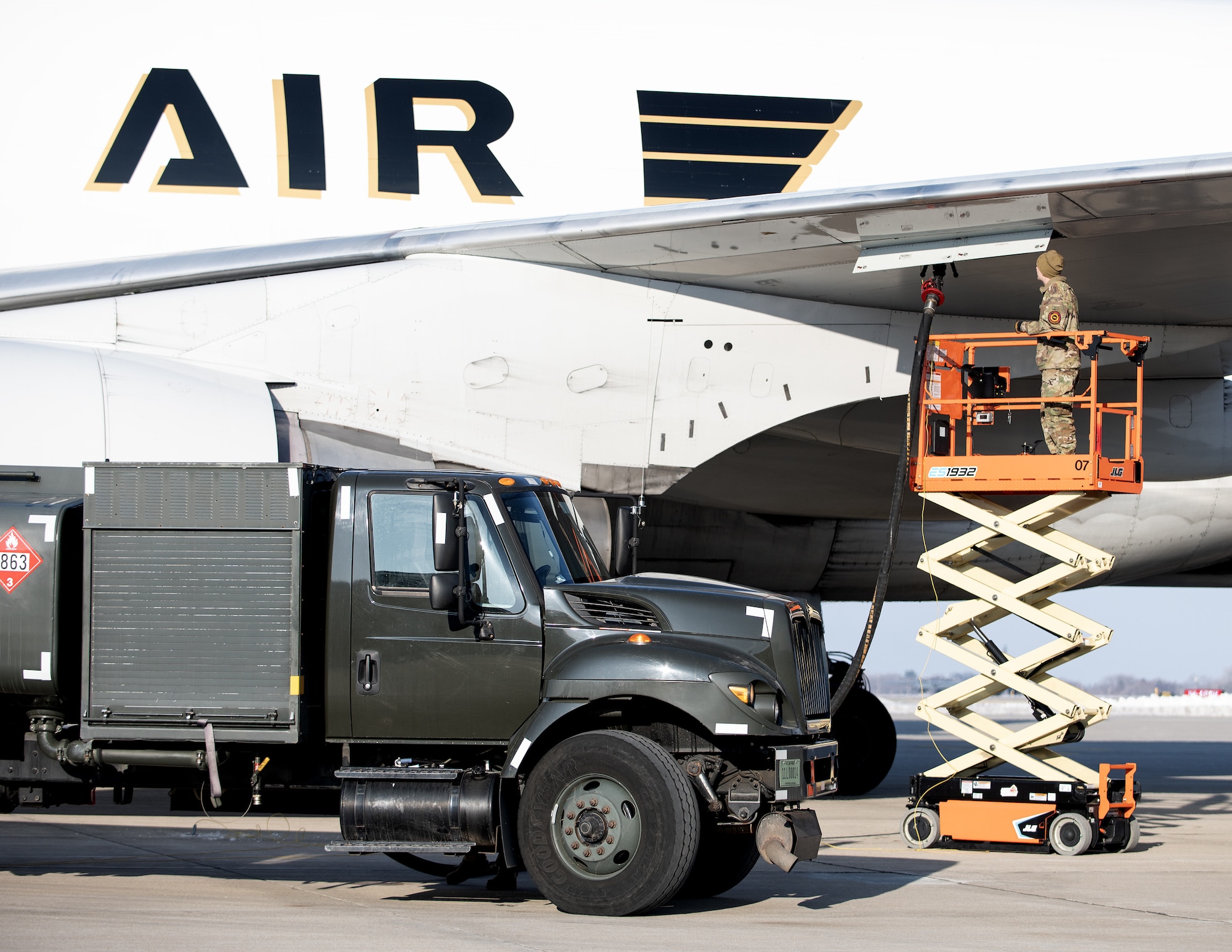 U.S. Air Force Airmen from the 133rd Air Transportation Function load cargo onto a Boeing 747 transport aircraft in St. Paul, Minn., Feb. 26, 2026.