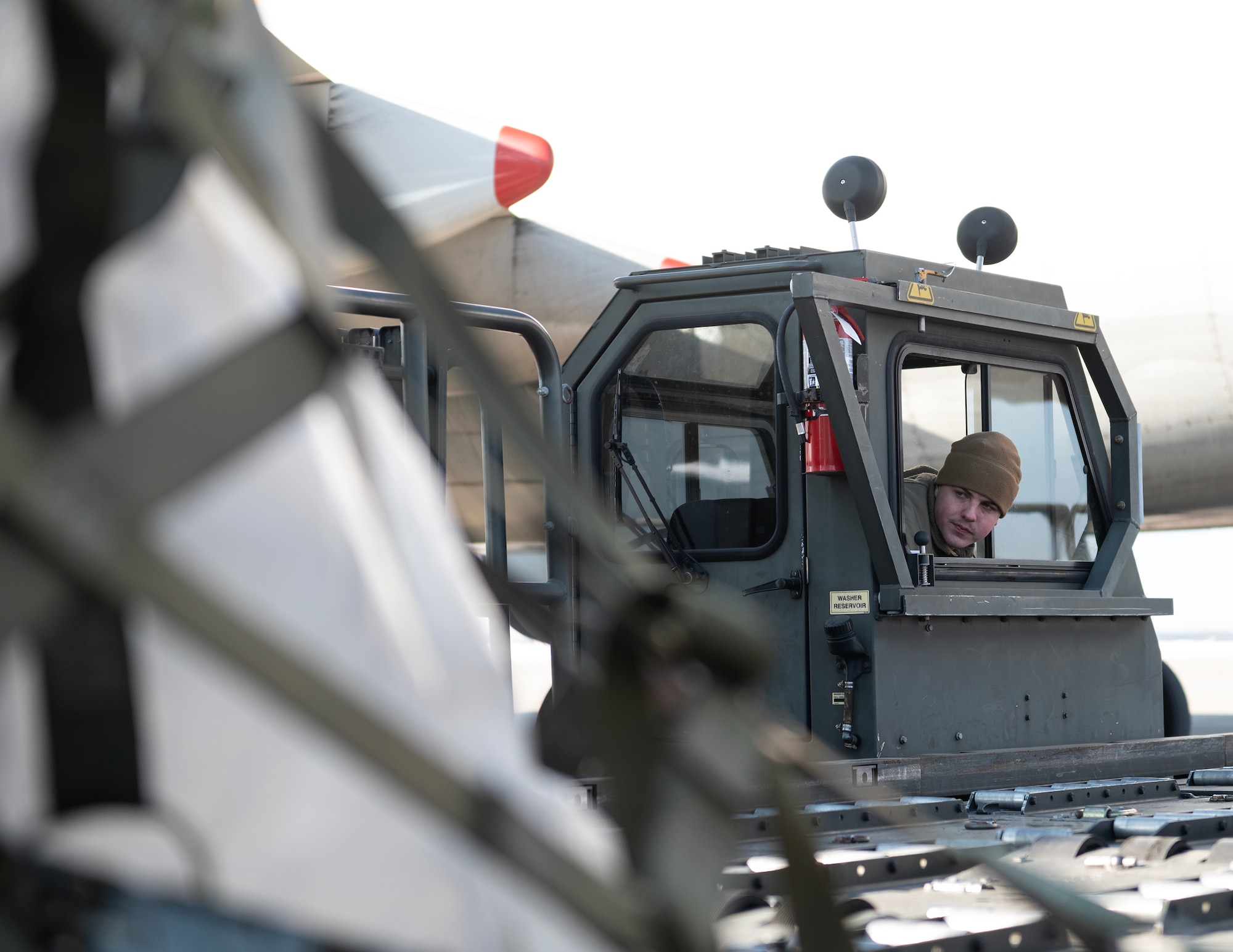 U.S. Air Force Airmen from the 133rd Air Transportation Function load cargo onto a Boeing 747 transport aircraft in St. Paul, Minn., Feb. 26, 2026.
