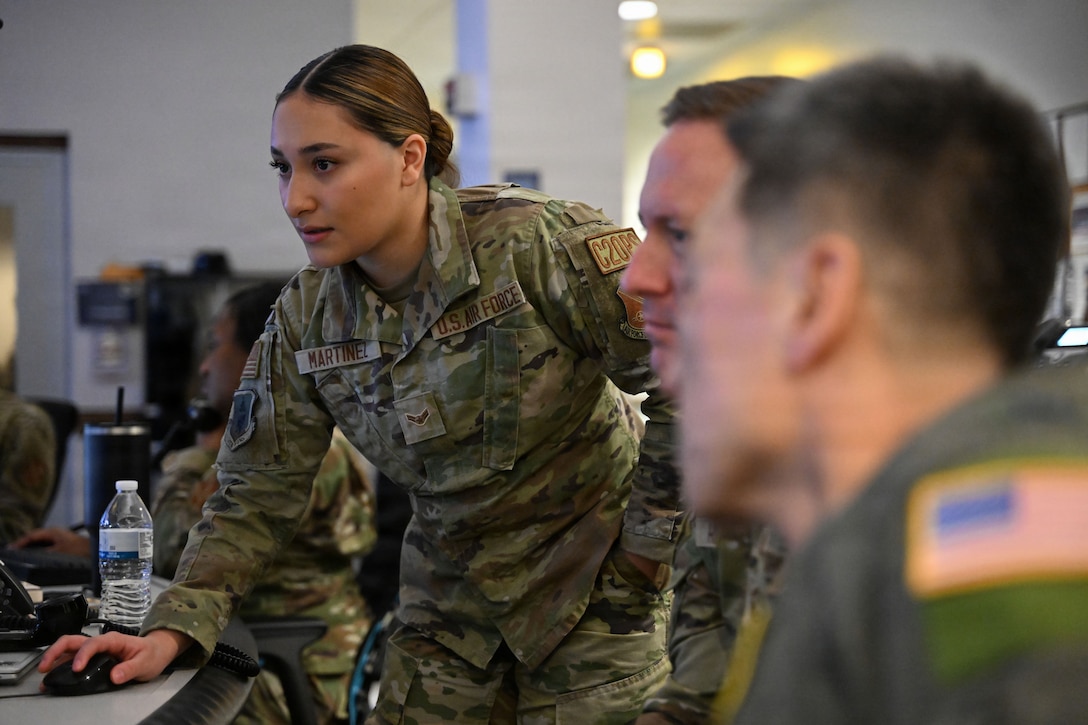 U.S. Air Force Airman 1st Class Natalie Martinez, demonstrates how to execute a task.