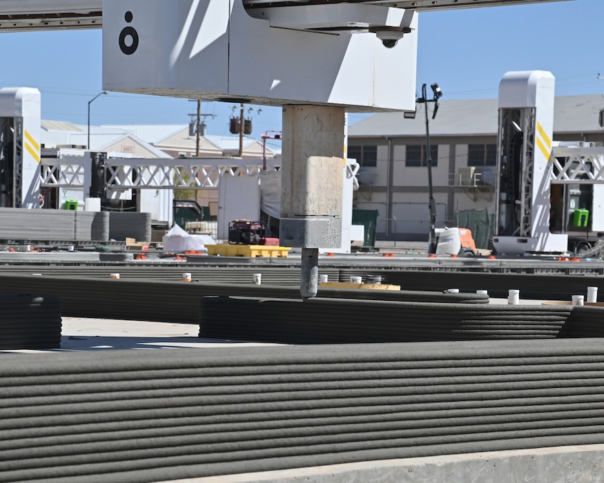 Multiple construction-scale 3D-printers operate simultaneously at Fort Bliss in West Texas. In total, 10 barracks will be constructed over a six-month period. Each barracks will house up to 56 soldiers deployed to the base. The $62.8 million contract for the new buildings was awarded to ICON. Under the Army’s traditional process of building barracks, it could take years to plan, fund, design, and construct new barracks according to 1st Armored Division and Fort Bliss Commander Maj. Gen. Curtis Taylor.