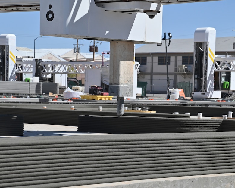Multiple construction-scale 3D-printers operate simultaneously at Fort Bliss in West Texas. In total, 10 barracks will be constructed over a six-month period. Each barracks will house up to 56 soldiers deployed to the base. The $62.8 million contract for the new buildings was awarded to ICON. Under the Army’s traditional process of building barracks, it could take years to plan, fund, design, and construct new barracks according to 1st Armored Division and Fort Bliss Commander Maj. Gen. Curtis Taylor.