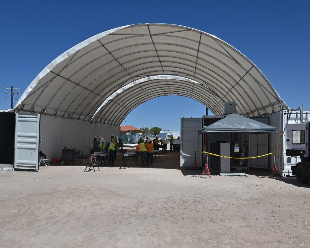 Known as the “Ghost Factory”, the on-site construction facility allows contractors to create roofing trusses as needed from cold-rolled steel. This results in cost savings by eliminating the need to transport completed trusses, and helps prevent manufacturing delays, as trusses are produced as needed based on each building’s progress.