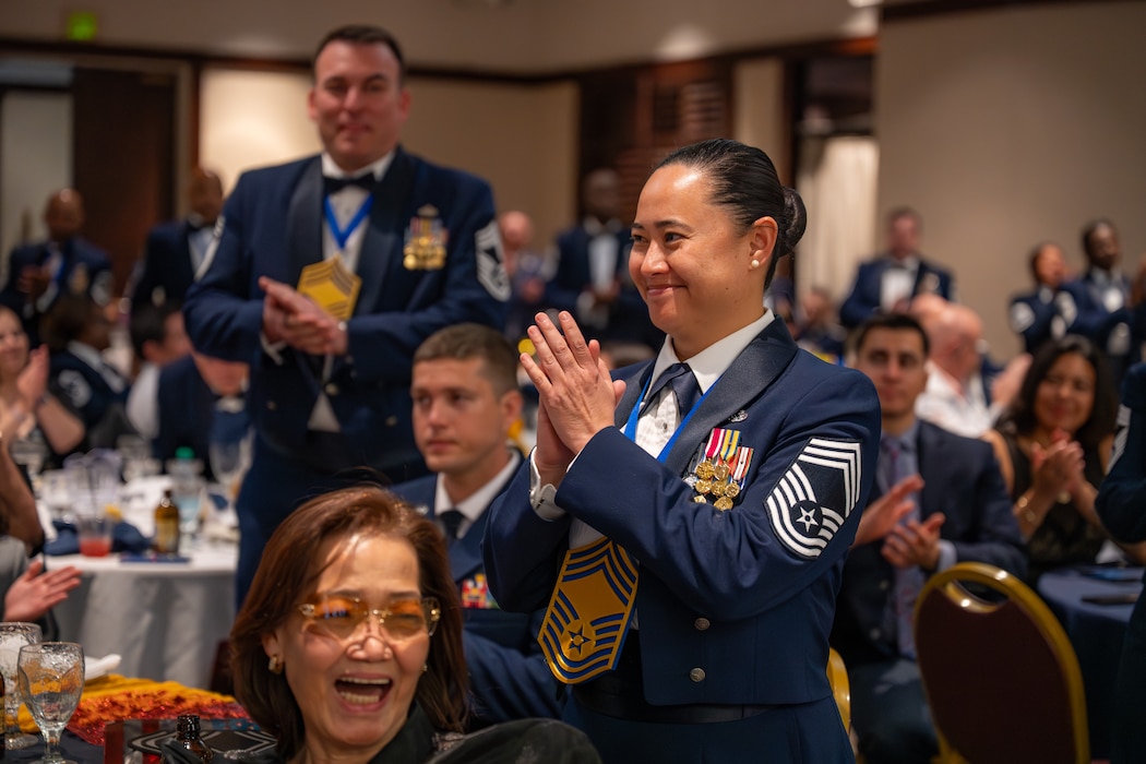 Chiefs clap together during a ceremony