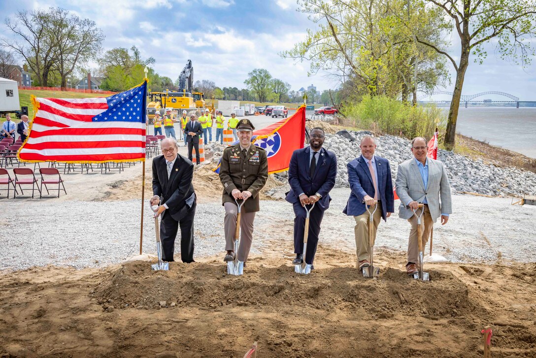 The U.S. Army Corps of Engineers (USACE) Memphis District held a groundbreaking ceremony, Mar. 30, to mark the beginning of construction to update and expand Greenbelt Landing, located at the north end of Mud Island near downtown Memphis.

The Greenbelt Landing Project will improve the park’s infrastructure and amenities by repairing the current boat ramp, constructing a second upstream ramp, installing mooring anchors, upgrading ADA-compliant parking, and adding additional lighting to enhance safety and accessibility. 

The Memphis River Parks Partnership, which manages the city’s public parks, is assisting with implementation efforts. (USACE Photo by Visual Information Specialist Vance Harris/Released)