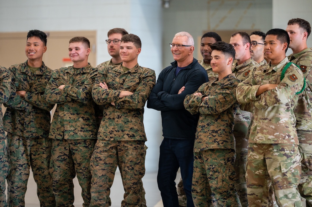 Chef Robert Irvine, a celebrity culinary chef, poses for a photo with students at the Louis F. Garland Fire Academy, Goodfellow AFB, Texas, March 6, 2026. Irvine’s foundation provided a Breaking Bread with Heroes Luncheon for the students.