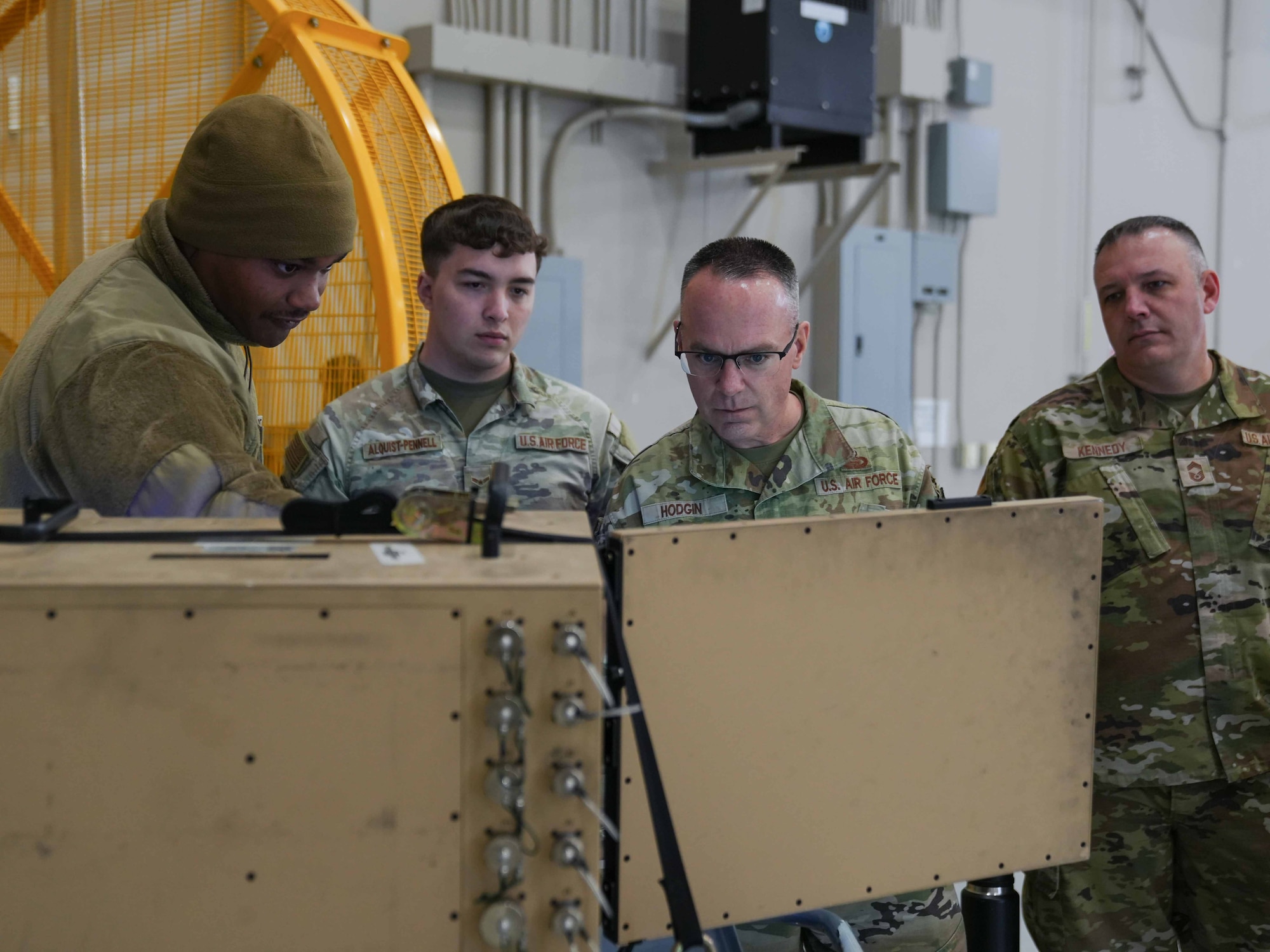 U.S. Air Force Chief Master Sgt. Timothey Hodgin, Air Force Research Laboratory command chief, observes a Portable Aircraft Control Station with Airmen assigned to the 25th Aircraft Maintenance Squadron at Creech Air Force Base, Nevada, Jan. 9, 2026.