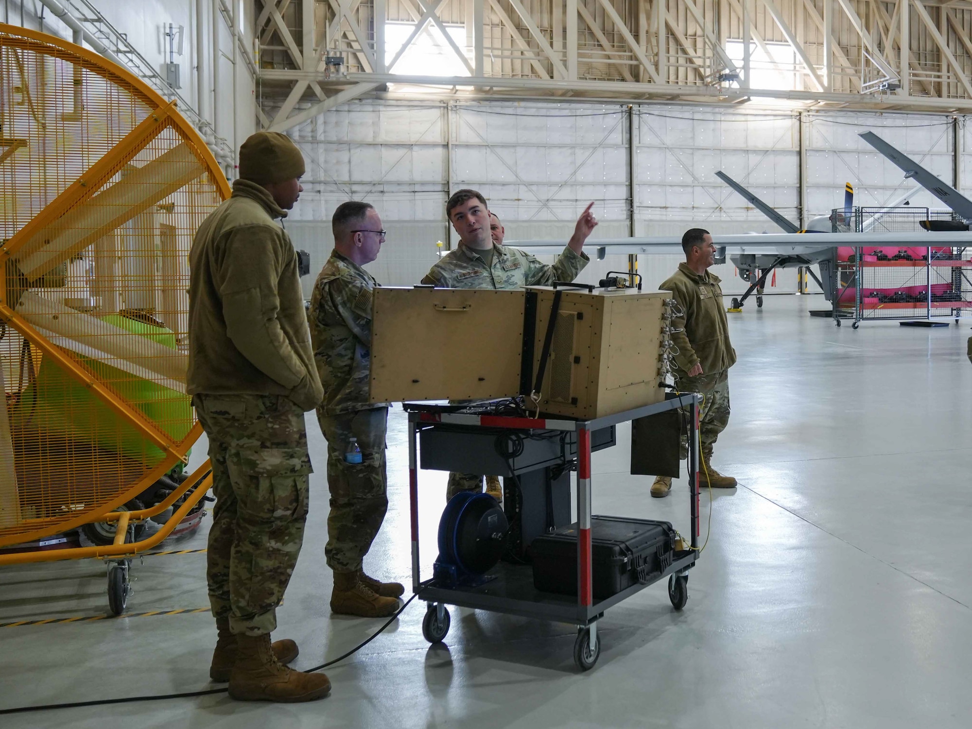 U.S. Air Force  Chief Master Sgt. Timothey Hodgin, Air Force Research Laboratory command chief, observes a Portable Aircraft Control Station with Airmen assigned to the 25th Aircraft Maintenance Squadron at Creech Air Force Base, Nevada, Jan. 9, 2026.