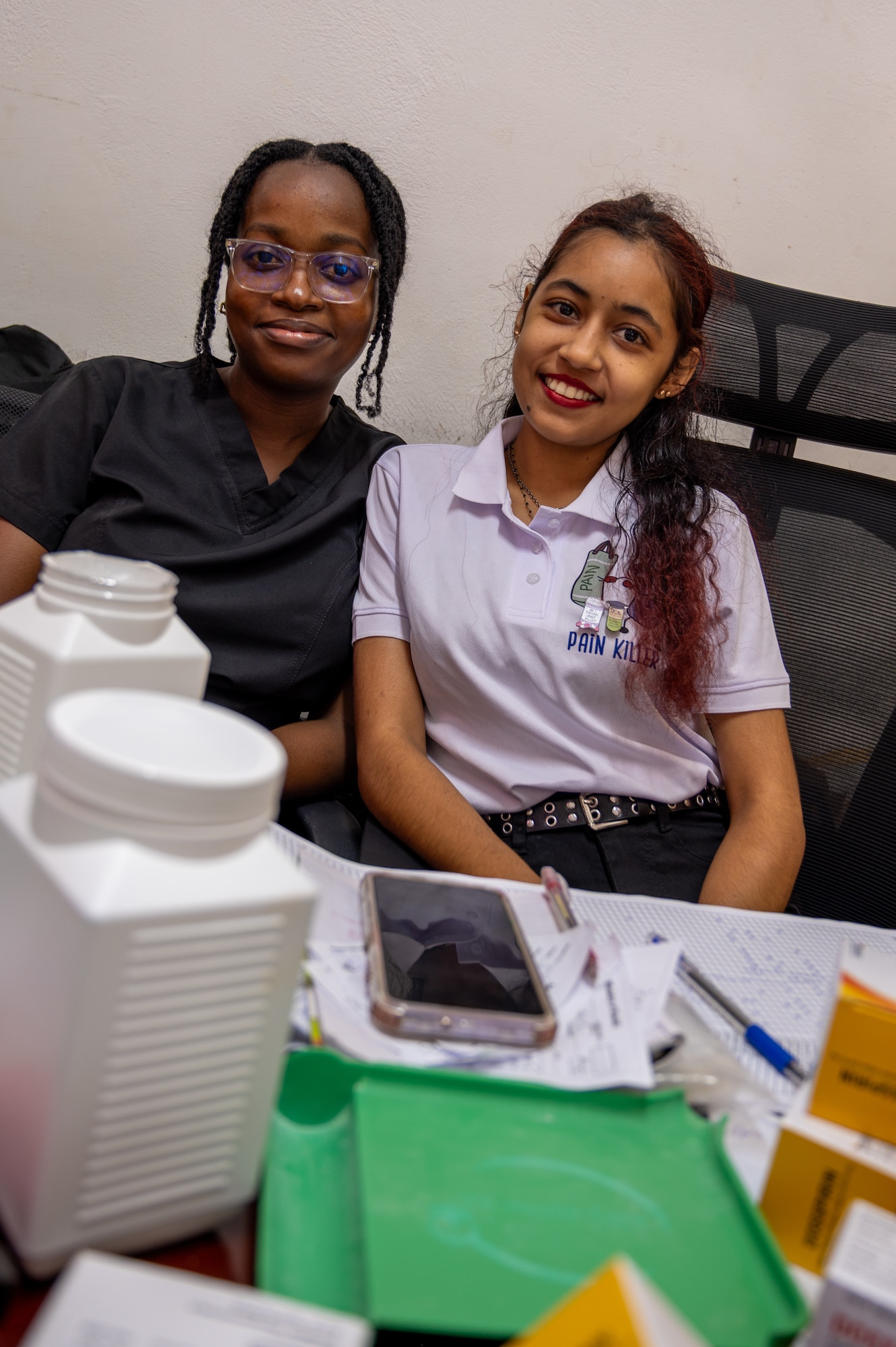 Ashley Abrams and Darshanie Singh, both Guyanese pharmacy technicians at the West Demerara Regional Hospital, pose for a photograph inside the hospital’s outpatient pharmacy in Vreed en Hoop, Guyana, March 19, 2026. As part of the Lesser Antilles Medical Assistance Team 2026 mission, U.S. Air Force medical personnel assisted pharmacy services in support of high patient volumes, improving access to medications while enhancing readiness and strengthening regional partnerships. (U.S. Air Force Photo by Maj. Stephani Schafer)