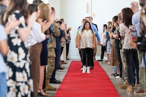 Local high school seniors walk a red carpet as they enter the inaugural Military-Connected Senior Recognition Ceremony at Sheppard Air Force Base, Texas, March 29, 2026.