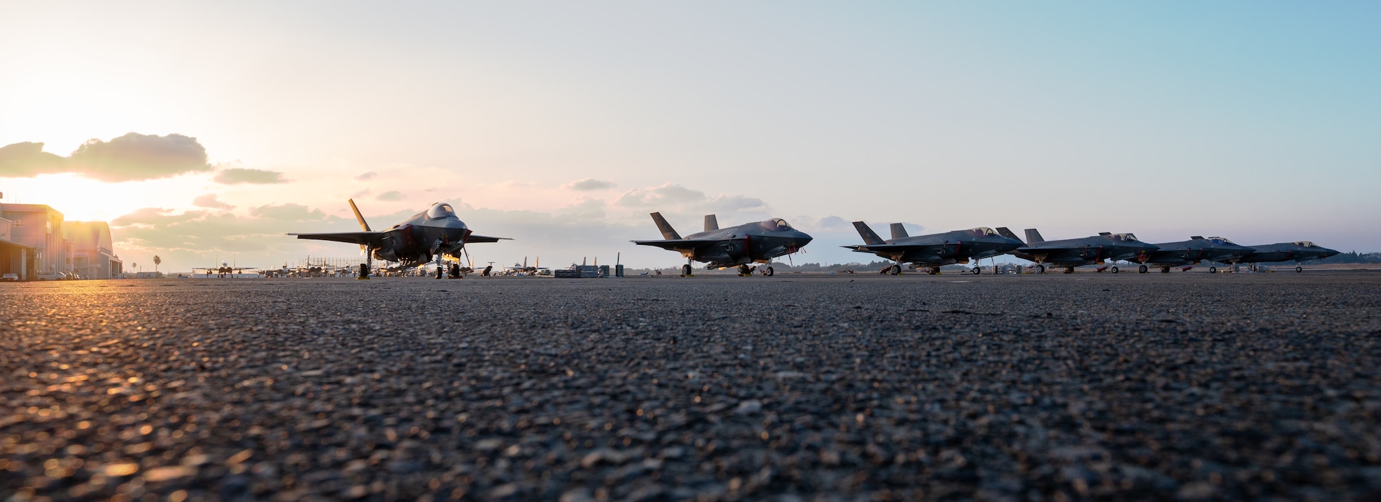 U.S. Air Force F-35A Lightning IIs assigned to the 4th Expeditionary Fighter Squadron, deployed to Kadena Air Base, sit on the flight line during Nyutabaru Aviation Training Relocation exercise 26-1 at Japan Air Self-Defense Force Nyutabaru Air Base, Japan.