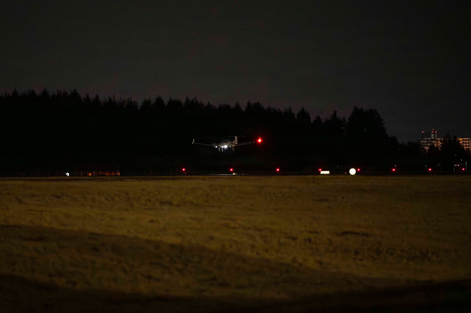 A Diamond DA42 NG Twin Star assigned to the Yokota Flight Center lands during a small parts delivery mission as part of exercise Beverly Midnight 2026 at Yokota Air Base, Japan, March 13, 2026. BM26 provides an optimal environment to enhance and understand possible opportunities to continue the advancement of shared interests