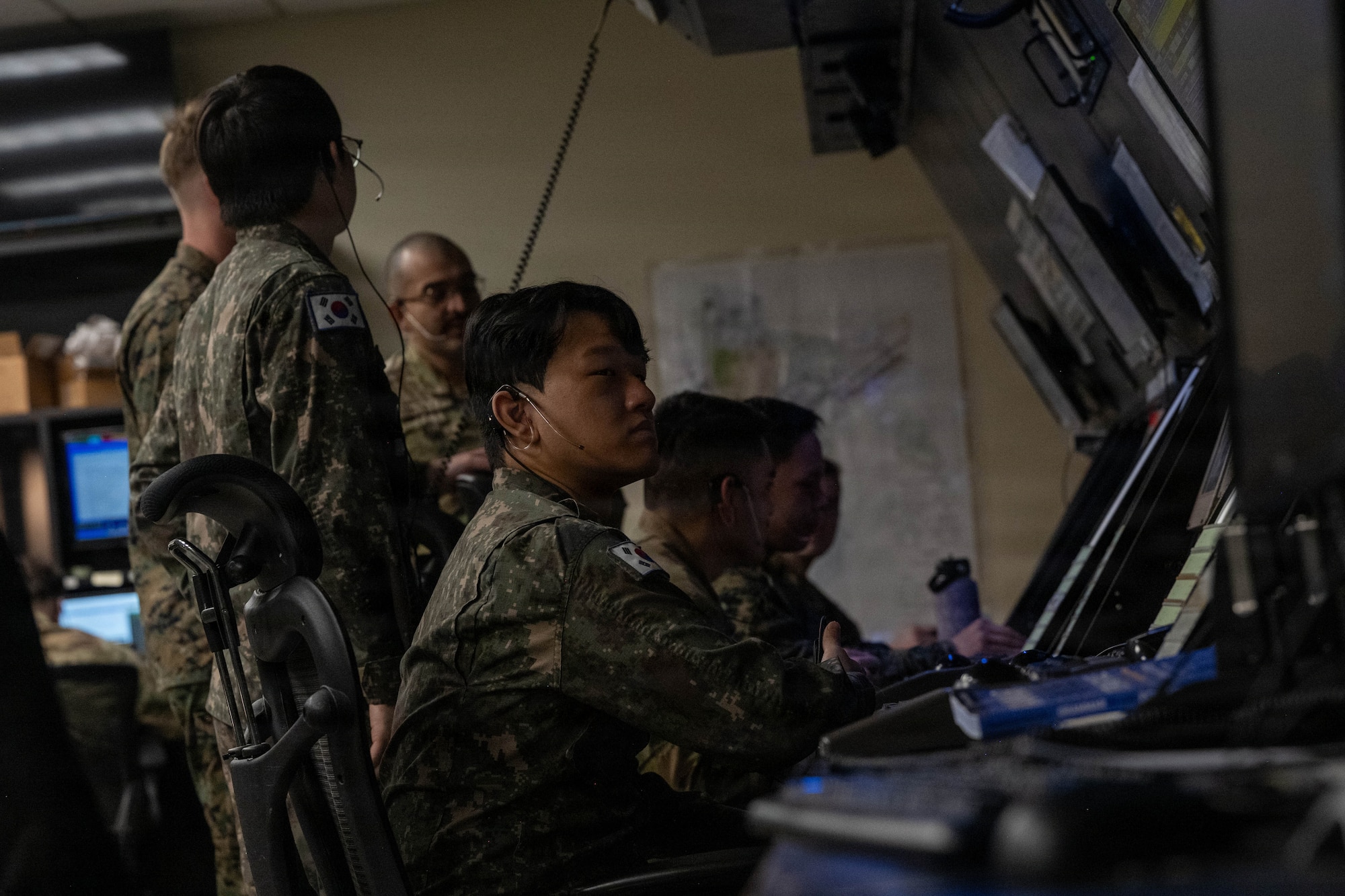 Service members from the Republic of Korea conduct air traffic control operations.