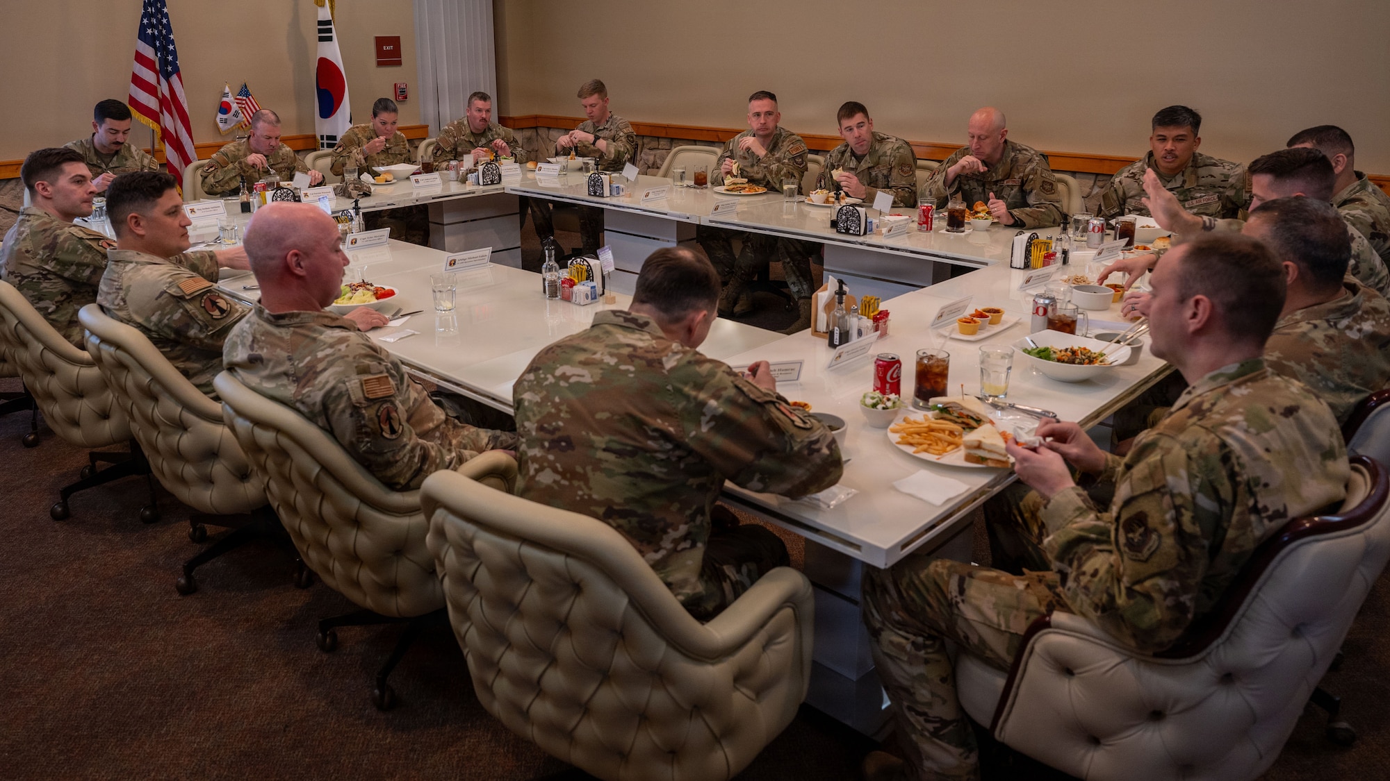 U.S. Air Force Airmen from the 731st Air Mobility Squadron attend a lunch with Eighteenth Air Force leadership at Osan Air Base, Republic of Korea, April 1, 2026. The engagement allowed leadership to observe operations and discuss how Osan Airmen contribute to the defense of the Korean Peninsula. (U.S. Air Force photo by Senior Airman Rome Bowermaster)