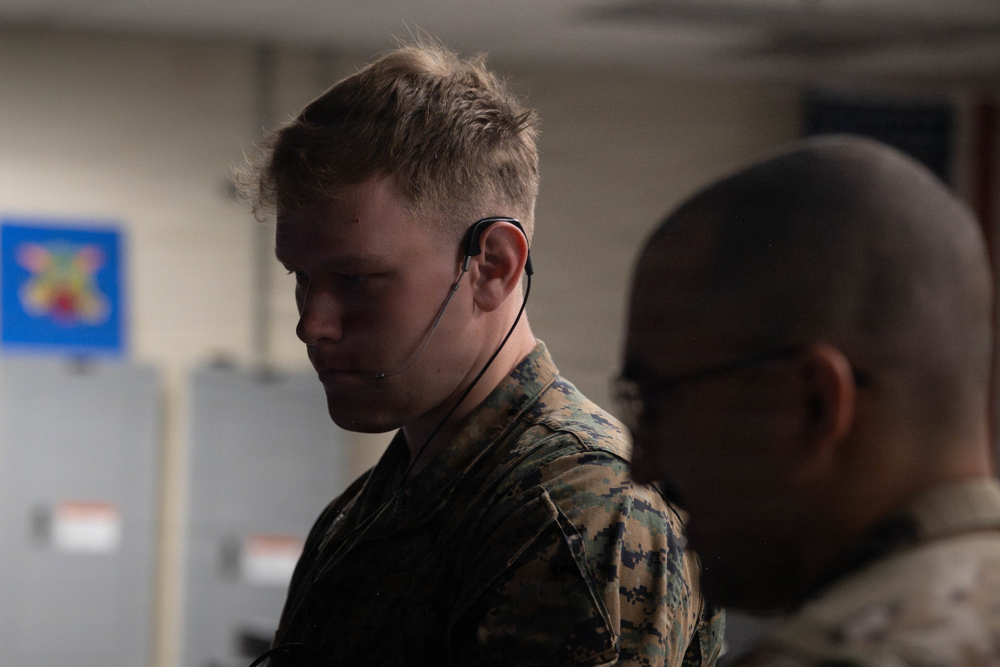 Marine observes air traffic control operations.