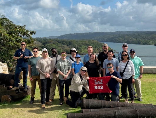 The 542nd Forward Engineer Support Team-Advanced, pose with the team guidon.