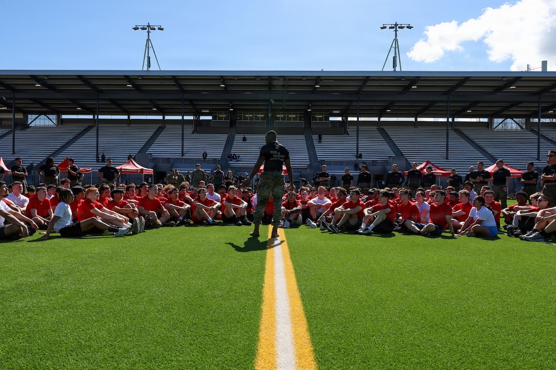 U.S. Marine Corps Gunnery Sgt. Devontay Dixon, supply chief with Recruiting Station Seattle, speaks to poolees during the RS Seattle annual pool function in Renton, Washington, March 28, 2026. The annual pool function is an opportunity for future Marines to build camaraderie, strengthen their commitment to the Marine Corps, and prepare for recruit training by competing in athletic competitions and receiving military related periods of instruction. (U.S. Marine Corps photo by Cpl. Aimee Jordan)