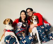Delia Chen, with her husband Chris and their three dogs (left to right – Sesame, Taco, Mei) at home during Christmas time in 2025.