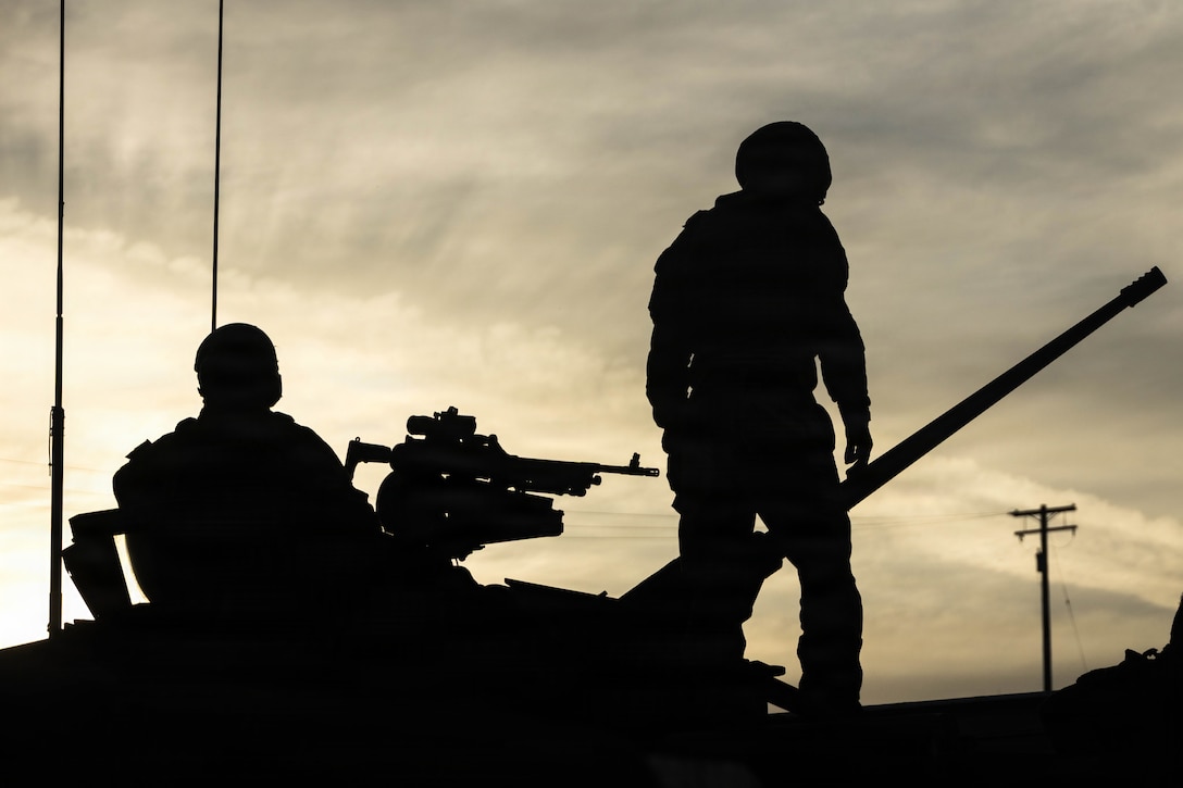 Australian Army soldiers with Gunnery Wing, School of Armor, conduct post-mission checks on their LAV-25 Light Armored Vehicle during the final phase of the Bushmaster 26 Competition at Marine Corps Base Camp Pendleton, California, March 27, 2026. The 2026 Bushmaster Competition, hosted by 4th Light Armored Reconnaissance Battalion, 4th Marine Division, is a multi-event challenge hosted annually by the U.S. Marine Corps Light Armored Reconnaissance community that evaluates LAV-25 crews, including ally partners, on tactical proficiency, marksmanship, physical endurance, and reconnaissance skills. (U.S. Marine Corps photo by Cpl. Sawyer Carleton)