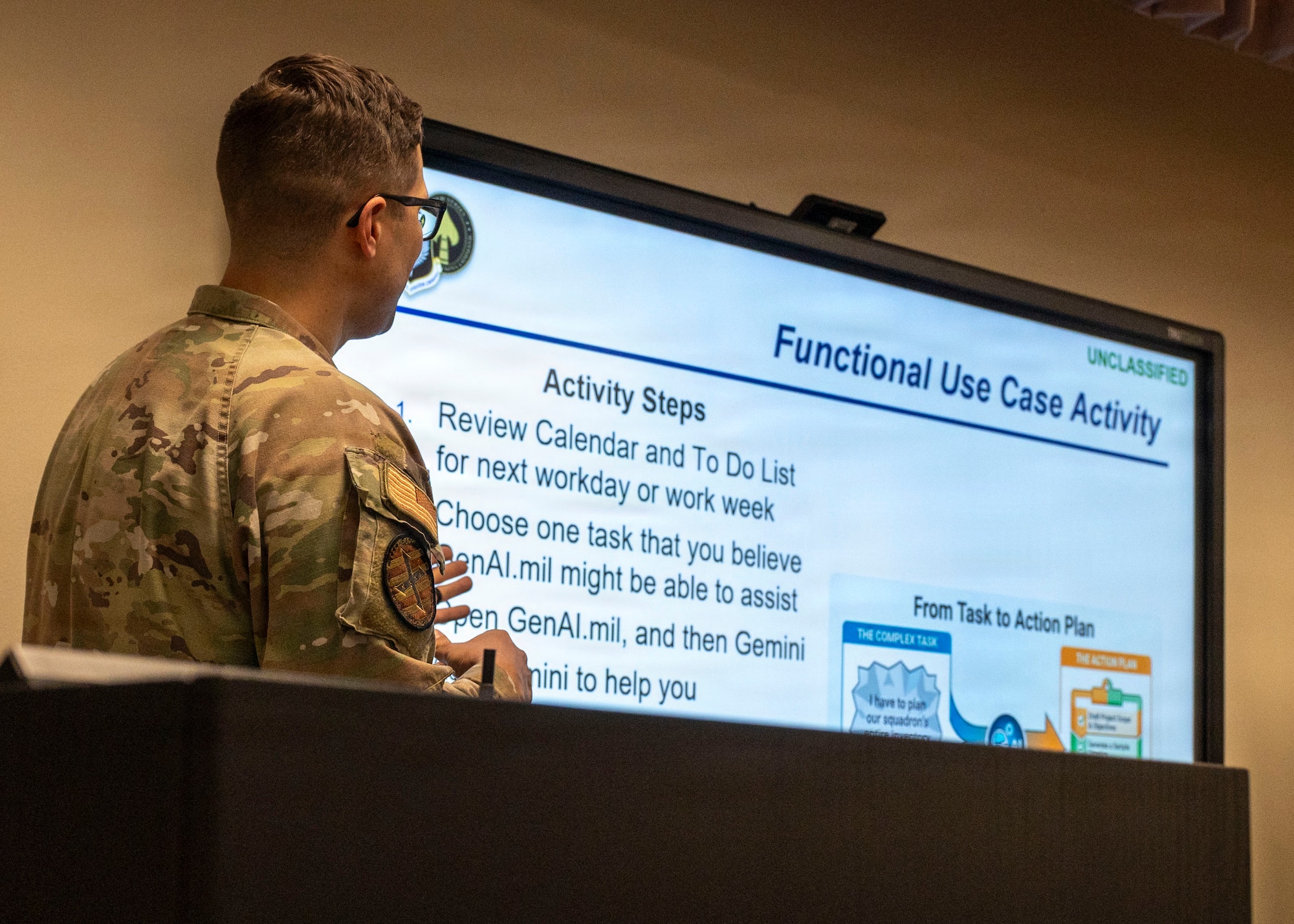An AFSOC AI Bootcamp instructor guides a practical exercise for accomplishing tasks with artificial intelligence.