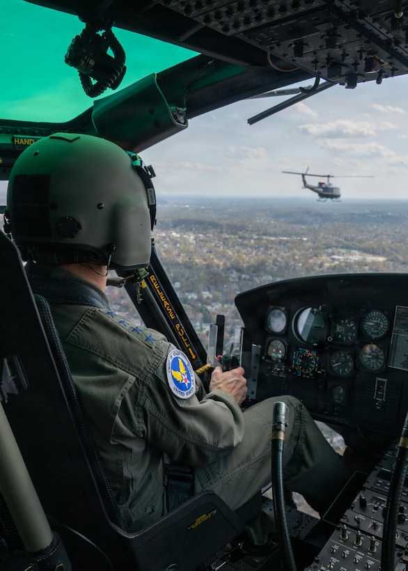 Air Force Chief of Staff Gen. Ken Wilsbach co-pilots a UH-1N Huey.