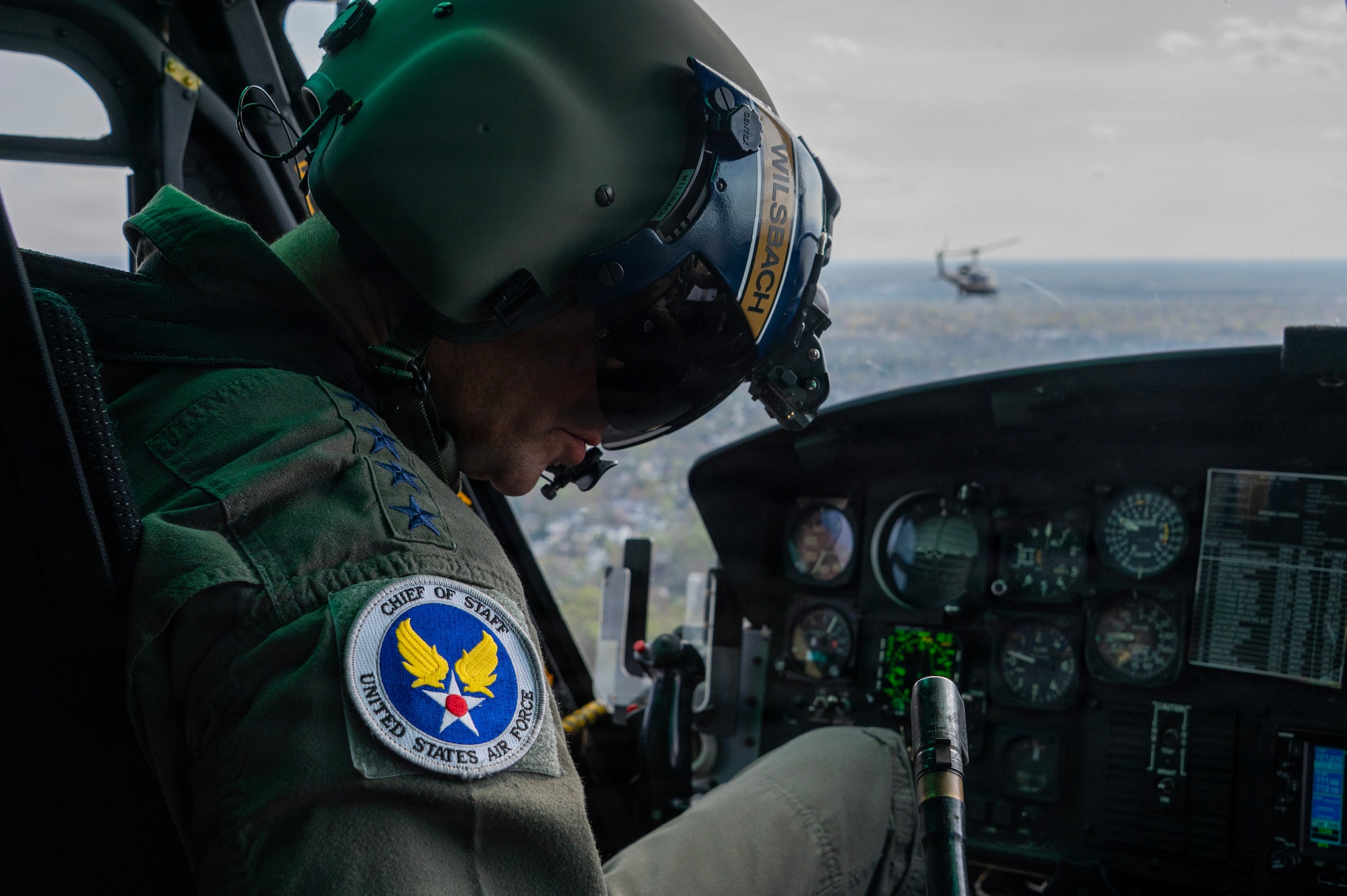 Air Force Chief of Staff Gen. Ken Wilsbach co-pilots a UH-1N Huey.
