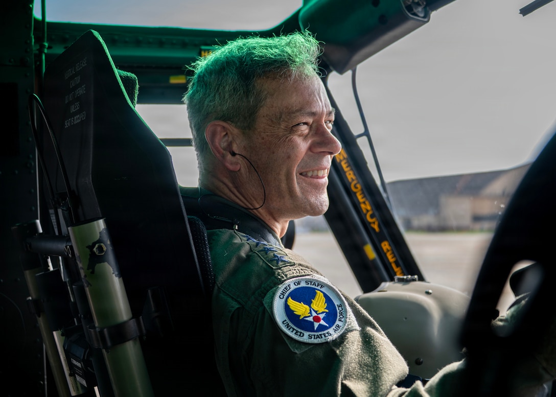 Air Force Chief of Staff Gen. Ken Wilsbach smiles after co-piloting a UH-1N Huey.