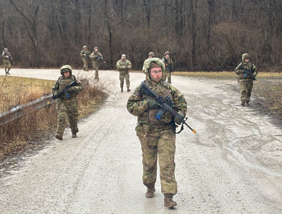 Sgt. Amanda Moberg leads a patrol during the 233rd’s "Road to War" training at Marseilles Training Area