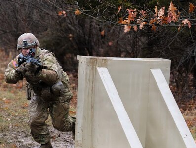 Sgt. Colton Peacok conducts bounding drills during “Road to War” training at Marseilles Training Area