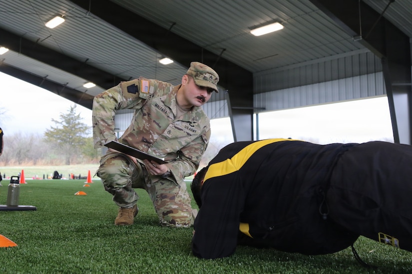 U.S. Army Staff Sgt. Leo Malfara, a Basic Leader Course (BLC) facilitator with 3rd Battalion, 166th Regiment - Regional Training Institute, Pennsylvania Army National Guard, evaluates BLC students during an Army Fitness Test at Fort Indiantown Gap, Pa. April 2, 2026. (U.S. Army National Guard photo by Sgt. 1st Class Shane Smith)