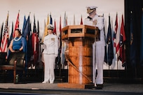 JOINT BASE PEARL HARBOR-HICKAM, Hawaii (March 12, 2026) – Cmdr. John Seers, Navy Chaplain, delivers the invocation during the change of command ceremony for Virginia-class fast-attack submarine USS Hawaii (SSN 776), at Sharkey Theater on Joint Base Pearl Harbor-Hickam, Hawaii, March 12, 2026. Hawaii is assigned to Submarine Squadron 1 and is capable of supporting various missions, including anti-submarine warfare, anti-surface ship warfare, strike warfare, special operations forces support, and intelligence, surveillance, and reconnaissance. (U.S. Navy photo by Mass Communication Specialist 2nd Class Nicholas Russell)