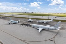 Sea Dragon anti-submarine warfare (ASW) competition participants pose for a group photo after the “Dragon Belt” was awarded to the Japan Maritime Self-Defense Force (JMSDF) for earning the highest average score all given ASW criteria at Andersen Air Force Base, Guam, March 18, 202