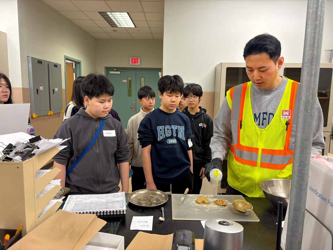 Photos of USACE FED employees' kids attending "Bring Your Kid to Work Day."