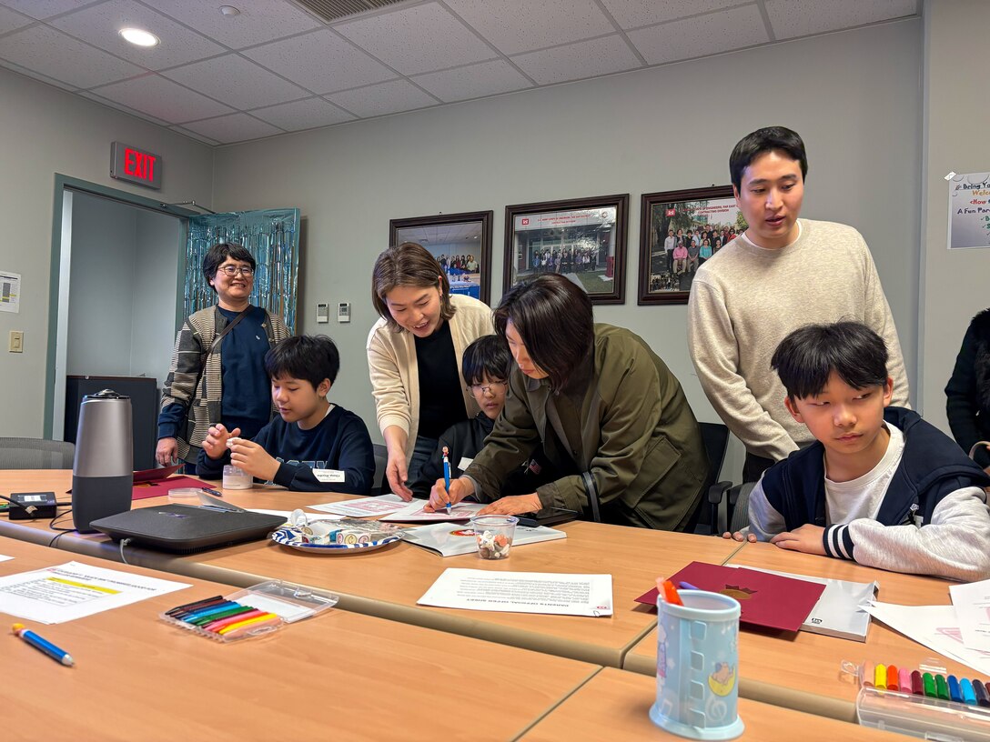 Photos of USACE FED employees' kids attending "Bring Your Kid to Work Day."