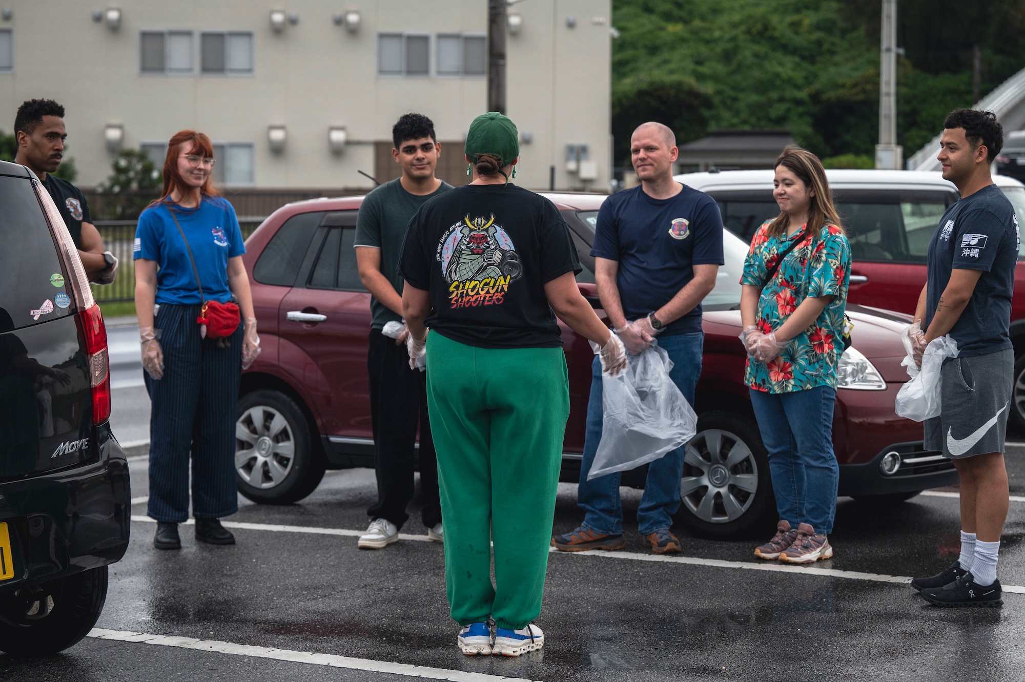 U.S. Air Force Capt. Anna Turpin, 18th Wing Public Affairs officer, briefs members of the 18th Wing prior to a clean up of Chatan Town, Japan, April 1, 2026.