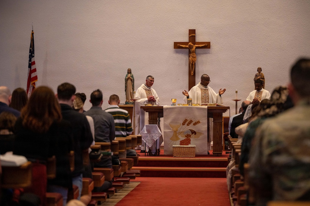 The pastoral team assigned to the 86th Airlift Wing prepares the Eucharist during a Holy Thursday mass at the Northside Chapel on Ramstein Air Base, Germany, April 2, 2026.
