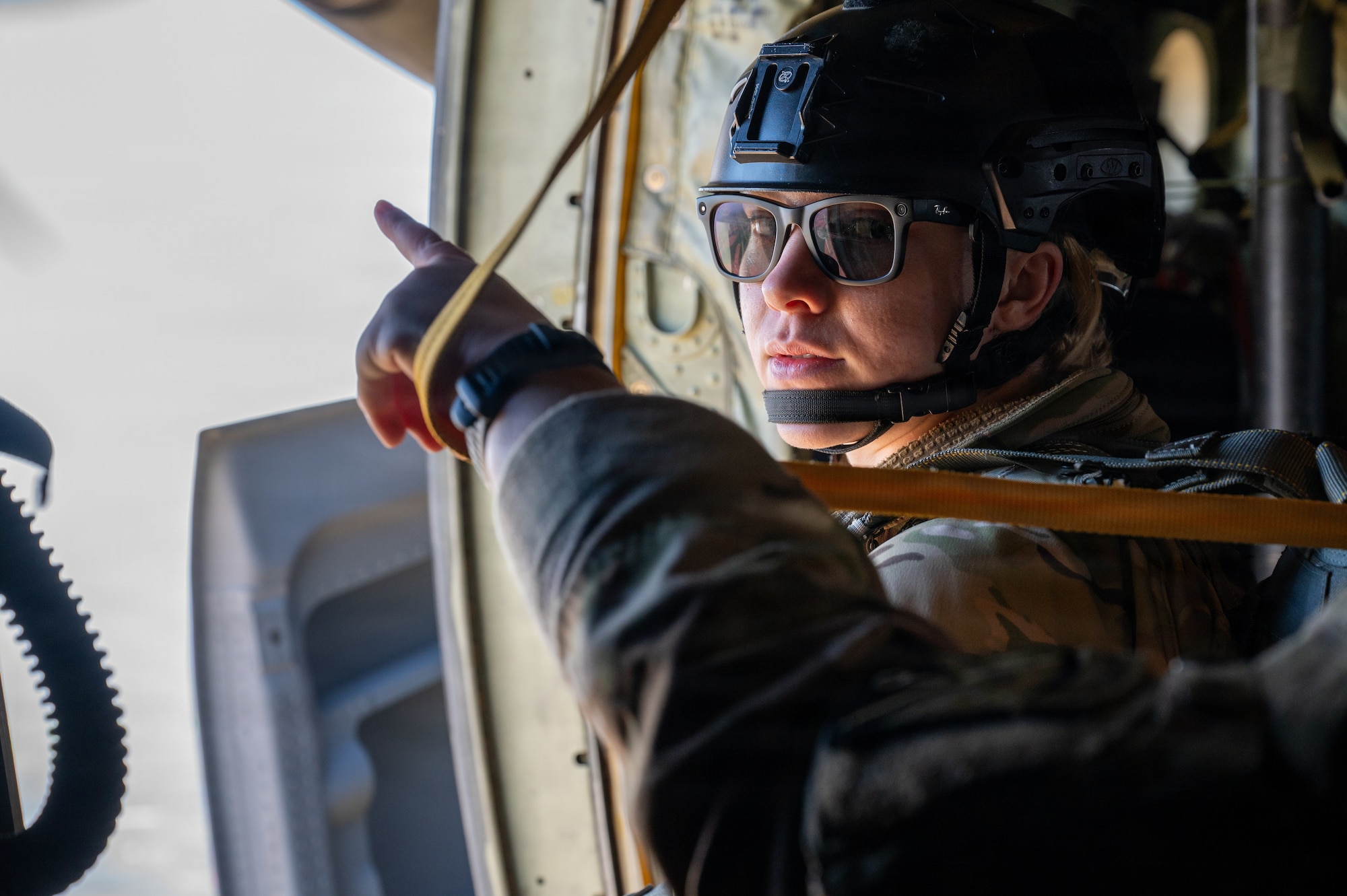 Man prepares to jump out of a plane
