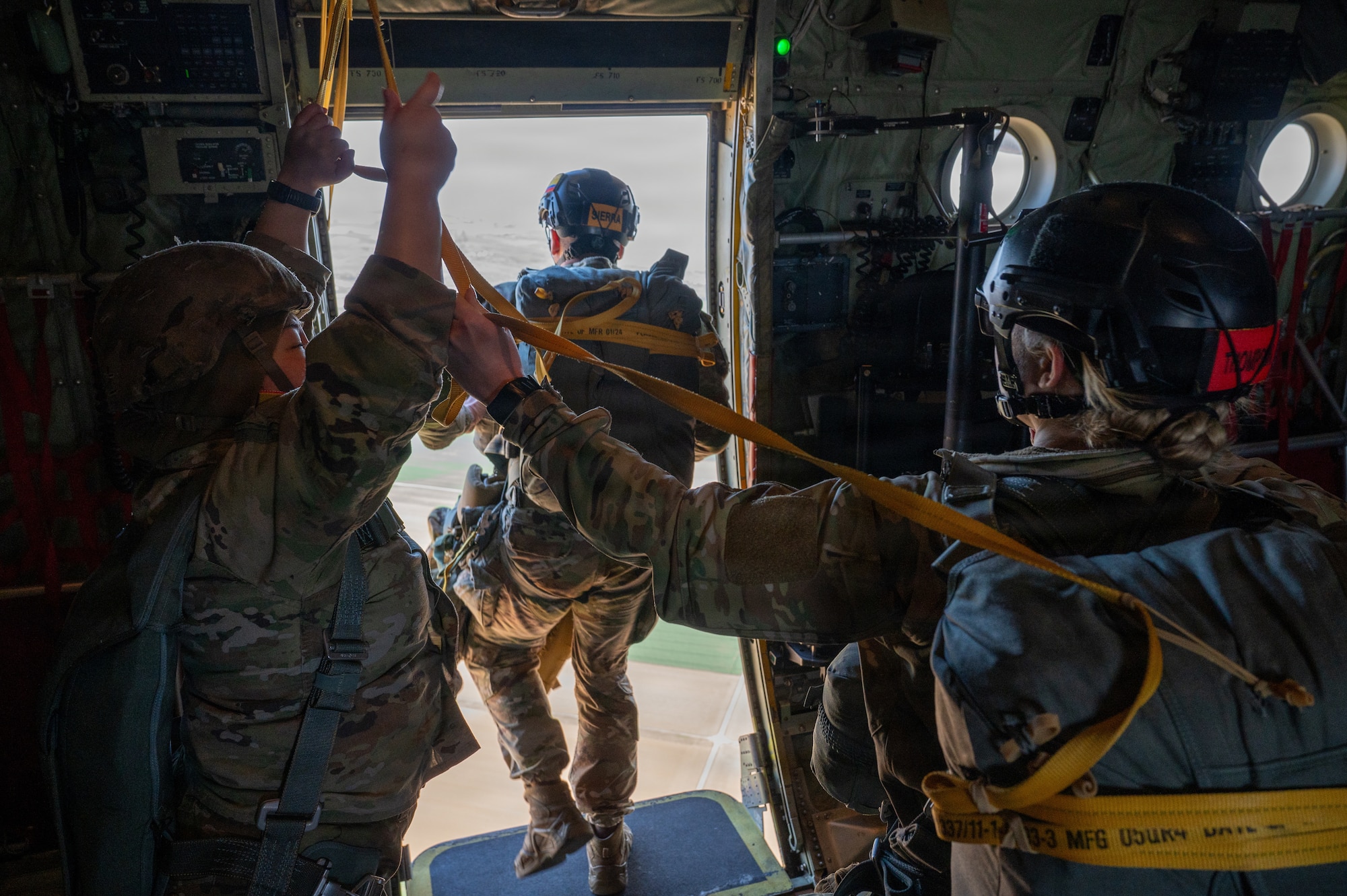 Man jumps out of a plan with a parachute