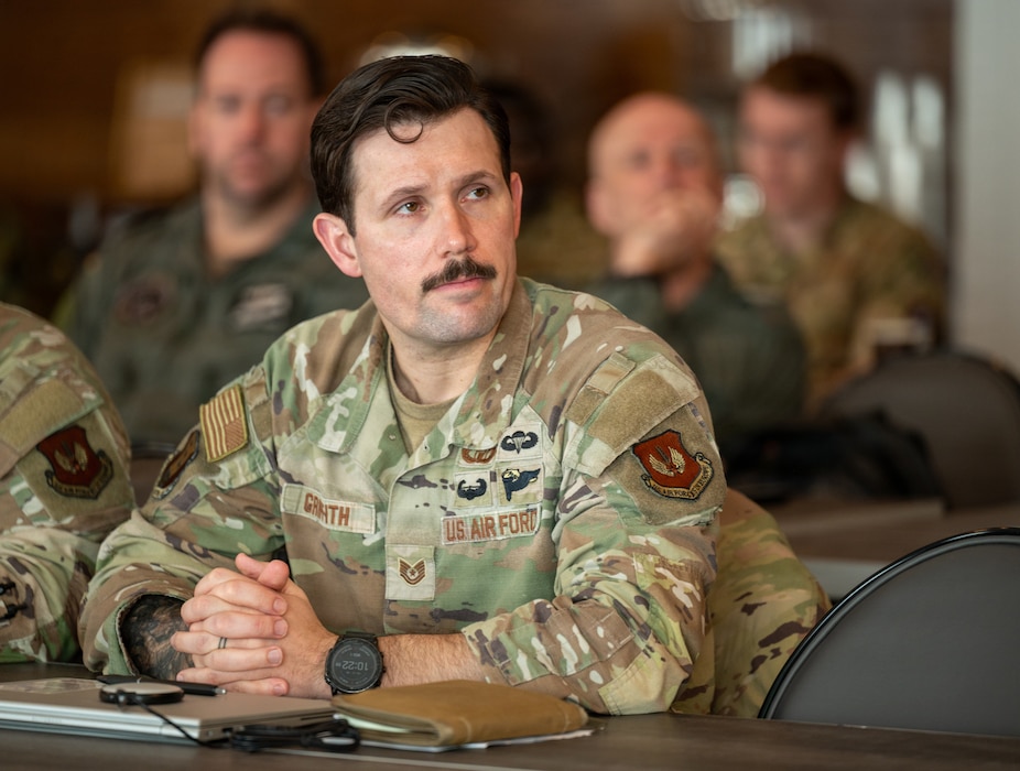 Man listens to briefing