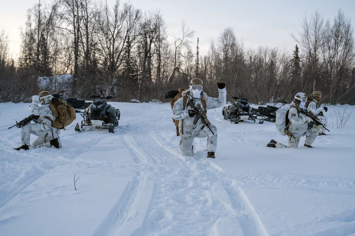 Tactical Air Control Party Airmen assigned to the 3rd Air Support Operations Squadron maneuver during arctic training at Joint Base Elmendorf-Richardson, Alaska, March 10, 2026. TACPs integrate with joint forces to deliver precision airpower in austere environments. (U.S. Air Force photo by Airman 1st Class Owen Davies)