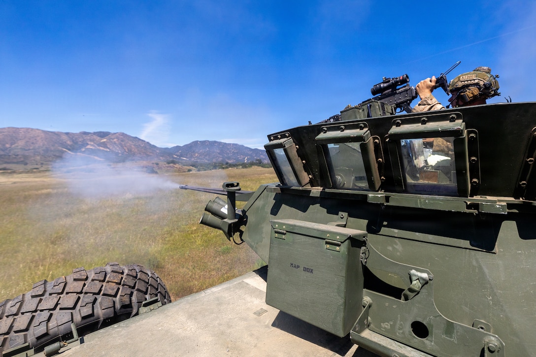 U.S. Marines with 2d Light Armored Reconnaissance Battalion, 2d Marine Division, fire the light armored vehicle 25’s main canon during the light armored vehicle live-fire range event during the 2026 Bushmaster Competition, Camp Pendleton, California, March 27, 2026. This year, hosted by 4th Light Armored Reconnaissance, 4th Marine Division, the friendly competition gathers Light Armored Vehicle crews from across the U.S. Marine Corps, Australia and New Zealand to test their tactical and technical skills. (U.S. Marine Corps photo by Sgt. Aaron TorresLemus)