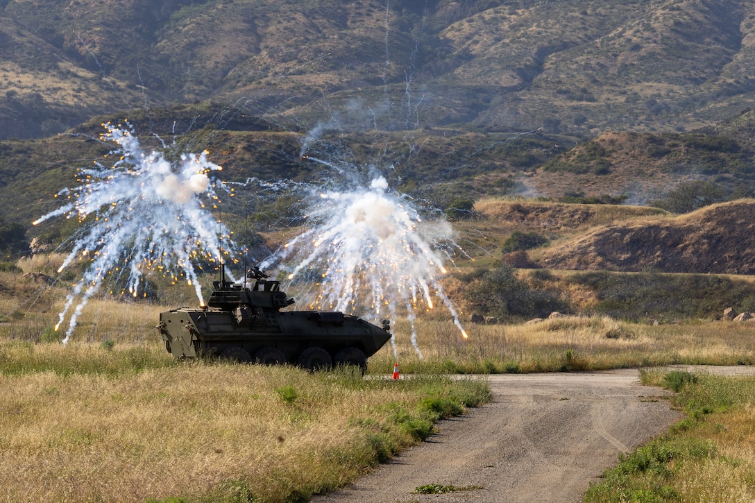 U.S. Marines participate in a light armored vehicle live-fire range event during the 2026 Bushmaster Competition, Camp Pendleton, California, March 27, 2026. This year, hosted by 4th Light Armored Reconnaissance, 4th Marine Division, the friendly competition gathers Light Armored Vehicle crews from across the U.S. Marine Corps, Australia and New Zealand to test their tactical and technical skills. (U.S. Marine Corps photo by Sgt. Aaron TorresLemus)