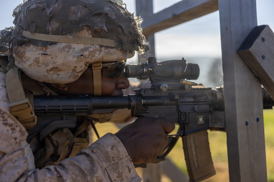 U.S. Marine Corps Lance Cpl. Kevin Zeron, a motor transport operator with 4th Light Armored Reconnaissance, 4th Marine Division, shoots down range during the rifle skill range portion event during the 2026 Bushmaster Competition, Camp Pendleton, California, March 25, 2026. This year, hosted by 4th Light Armored Reconnaissance, 4th Marine Division, the friendly competition gathers Light Armored Vehicle crews from across the U.S. Marine Corps, Australia and New Zealand to test their tactical and technical skills. (U.S. Marine Corps photo by Sgt. Aaron TorresLemus)