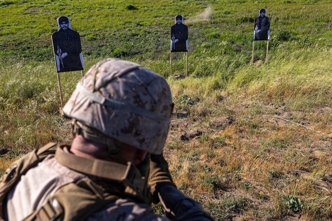 U.S. Marine Corps Sgt. Ian Shapiro, a light armored vehicle crewman with 4th Light Armored Reconnaissance, 4th Marine Division, shoots down range during the rifle skill range portion event during the 2026 Bushmaster Competition, Camp Pendleton, California, March 25, 2026. This year, hosted by 4th Light Armored Reconnaissance, 4th Marine Division, the friendly competition gathers Light Armored Vehicle crews from across the U.S. Marine Corps, Australia and New Zealand to test their tactical and technical skills. (U.S. Marine Corps photo by Sgt. Aaron TorresLemus)