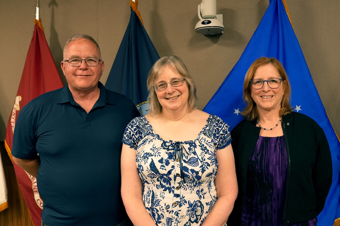 Francis Flynn (Left), Tara Perrien (Center), and Maria Silvester (Right) stand together as they were celebrated on their retirement from federal service on March 31 in Philadelphia. Photo Credit: Ed Maldonado