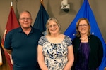 Francis Flynn (Left), Tara Perrien (Center), and Maria Silvester (Right) stand together as they were celebrated on their retirement from federal service on March 31 in Philadelphia. Photo Credit: Ed Maldonado