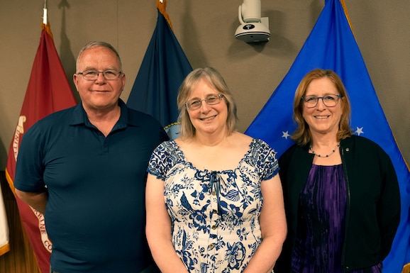Francis Flynn (Left), Tara Perrien (Center), and Maria Silvester (Right) stand together as they were celebrated on their retirement from federal service on March 31 in Philadelphia. Photo Credit: Ed Maldonado