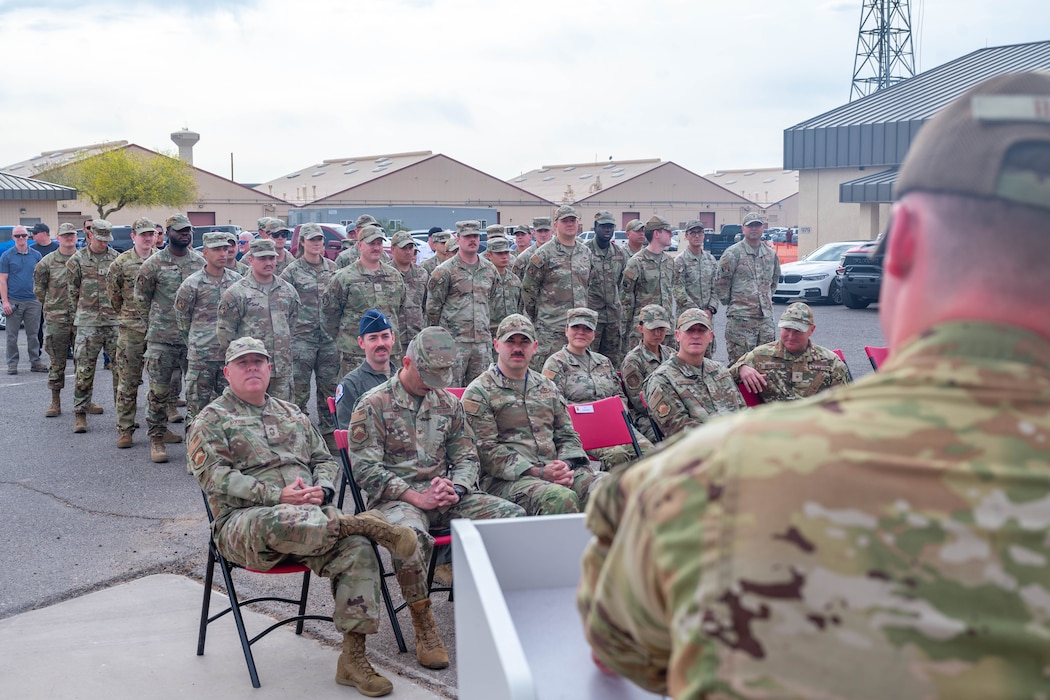U.S. Air Force Airman 1st Class Andrew Baird, 56th Civil Engineer Squadron firefighter apprentice, briefs Airmen about the official opening of Fire Station 2, March 31, 2026, at Luke Air Force Base, Arizona.