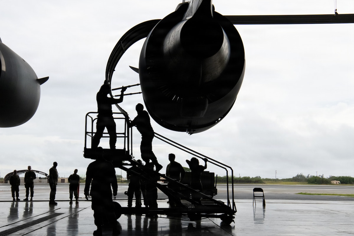 Airmen from the 515 Air Mobility Operations Wing perform repairs to an engine during the 2026 Mobility Vanguard Rodeo on Joint Base Pearl Harbor-Hickam, Hawaii, March 12, 2026. Aerial Port and Maintenance Career Fields came together to compete in various scenarios designed to increase readiness, improve interoperability and boost morale across the wing. (U.S. Air Force courtesy photo)