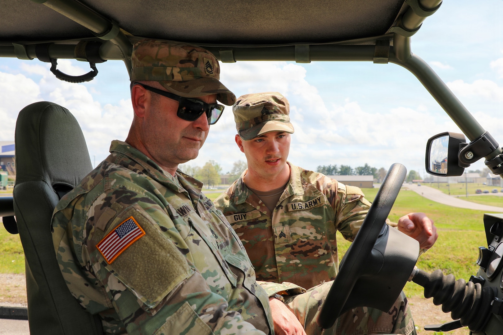 Sgt. 1st Class Jason Strawn and Sgt. Luke Guy, both Guardsmen with the Tennessee National Guard’s 278th Cavalry Regiment, learn to operate the new Infantry Squad Vehicle during training to become some of the state’s first licensed drivers at Fort Campbell, Kentucky, April 1, 2026.